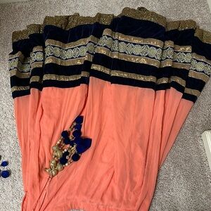 Pink, blue and gold chaniya choli for size 36 or 38 girl can fit.